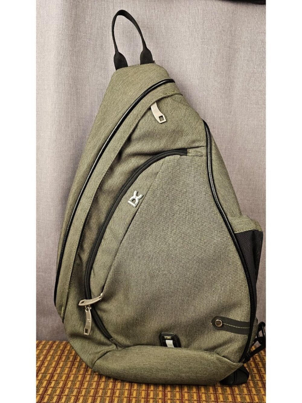 DC Sling Backpack Olive Black Adjustable Strap Multiple Compartments Durable Lig